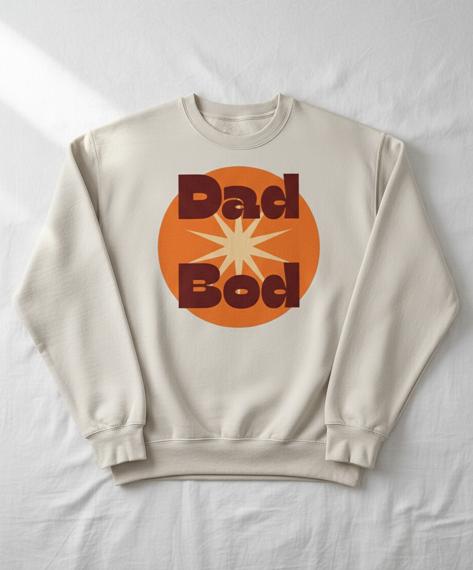 Beige sweatshirt with 'Dad Bod' graphic on a white background